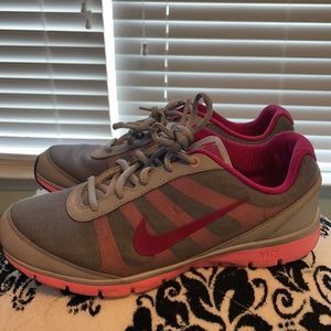 Pink and grey nikes size 8.5